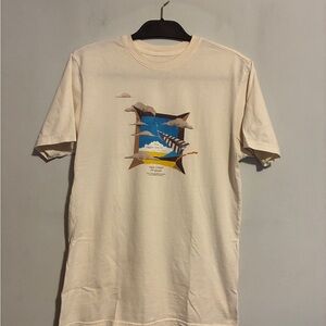 Paper Planes Cream Graphic Tee with Artistic Design